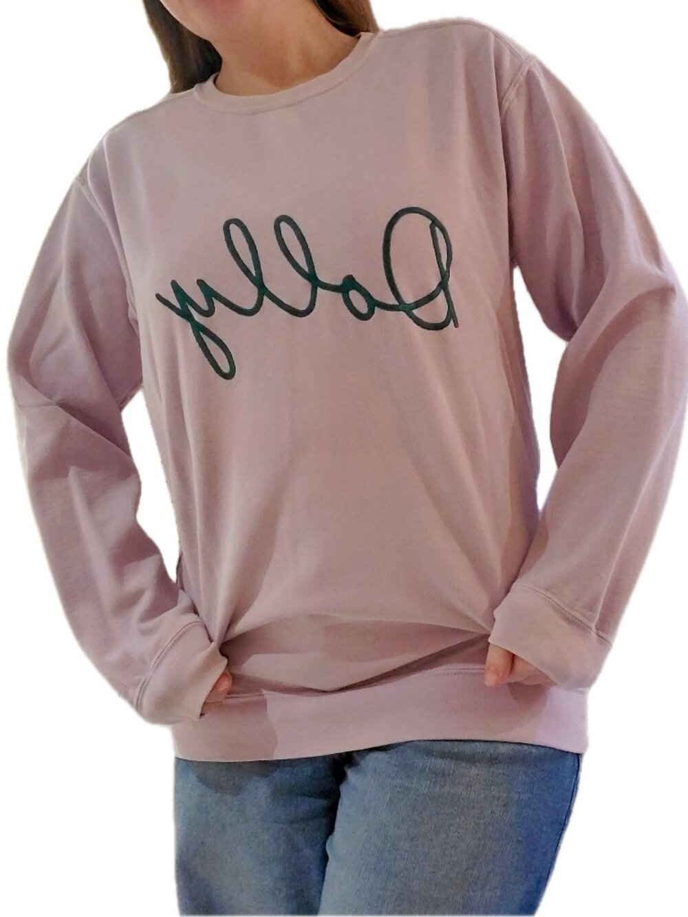 Comfort Colors lavender sweatshirt with “Dolly” in green lettering on the front